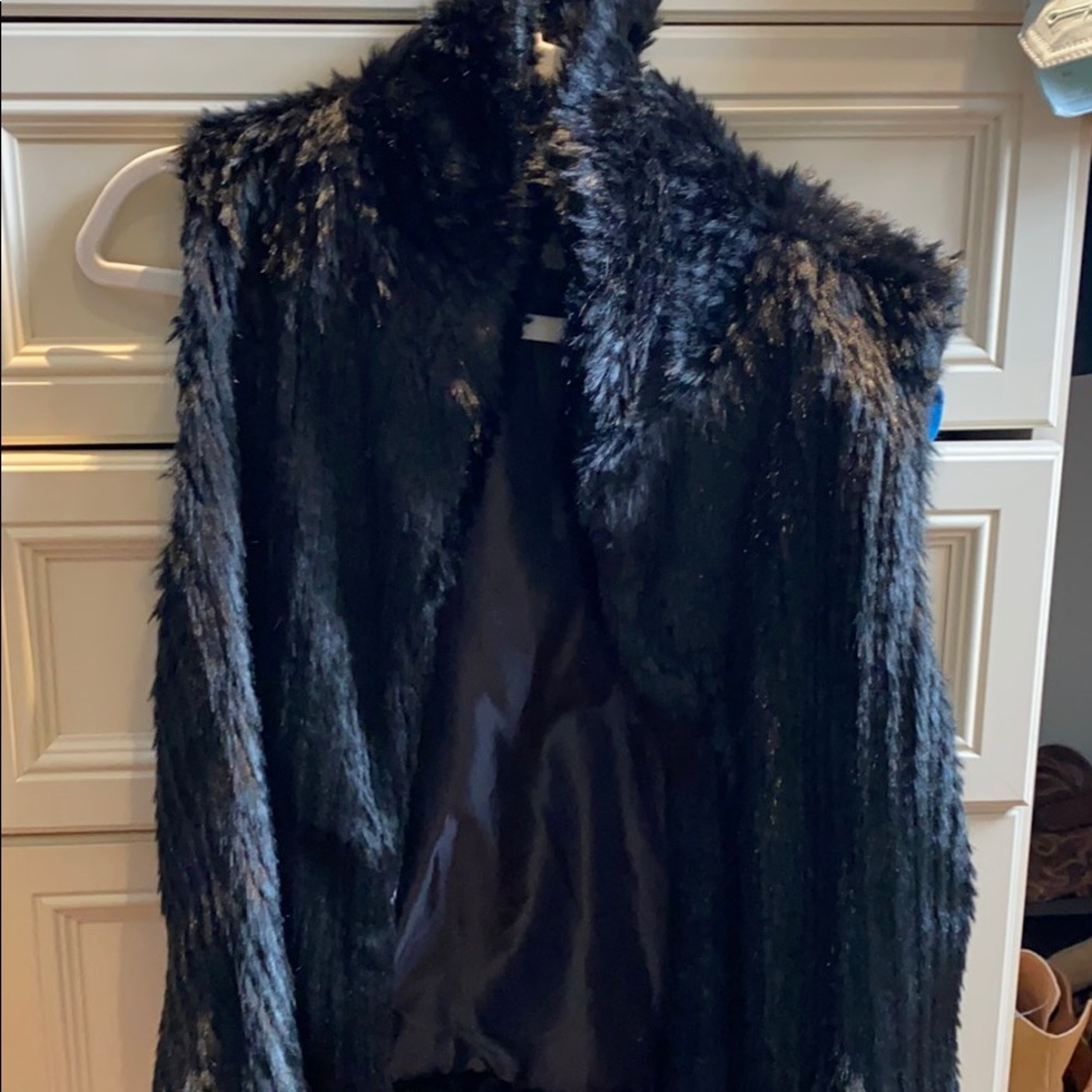 Black faux fur vest